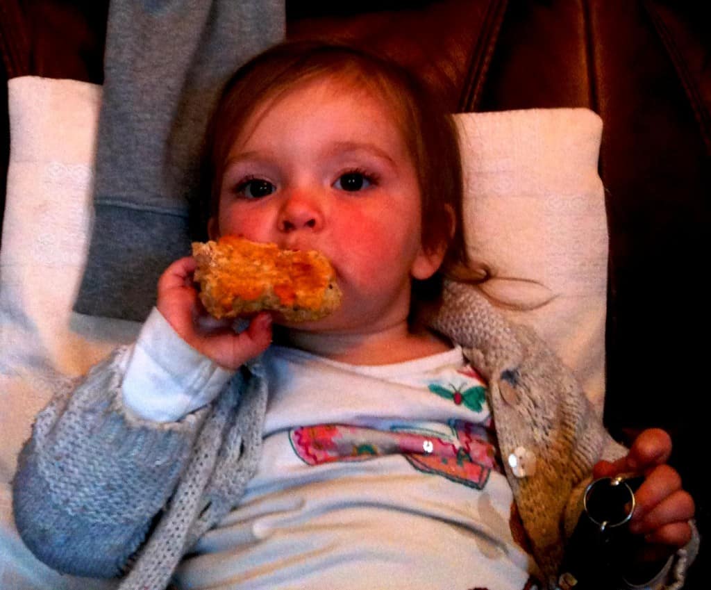 Ellie enjoying one of my cheese and onion scones