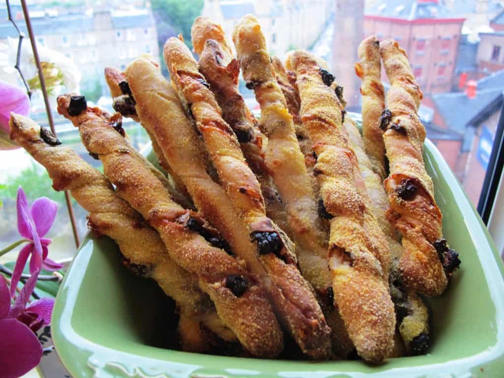 Parmesan breadsticks with olives and sun-dried tomatoes